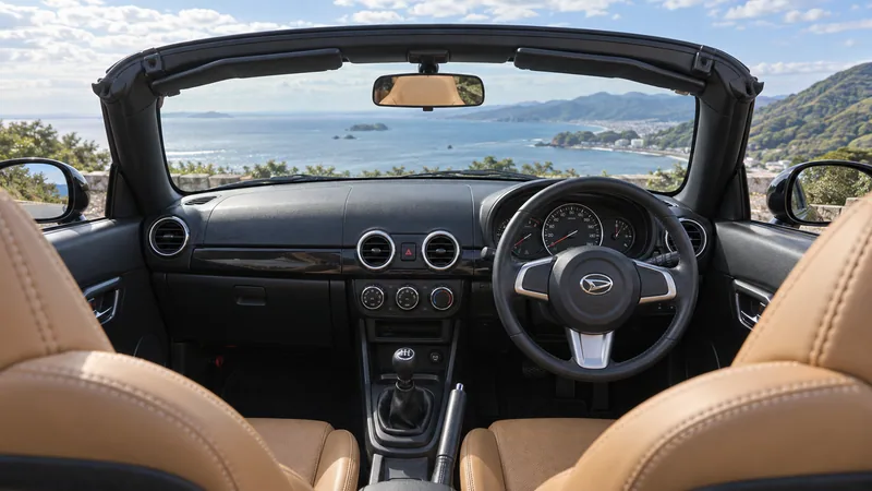 Праворульный салон Daihatsu Copen LA400K Cero с открытой крышей и 5МТ